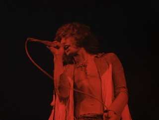 A red-lit Roger Daltrey sings The Who's "We're Not Gonna Take It" in full as part of Disc 2's epic Untold Stories section.