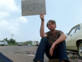 A boy tries to hitch a ride back to Boston in "Closing of Festival."