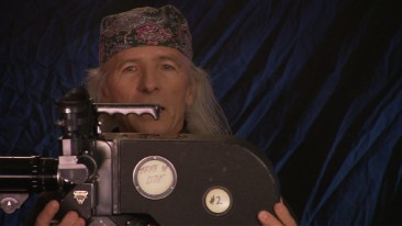 Director Michael Wadleigh shows off the cumbersome camera he used to shoot Woodstock in a "Woodstock: From Festival to Feature" short.