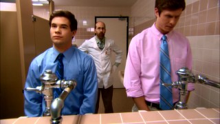 A close eye is kept on Adam and Anders as they urinate for the company drug test.