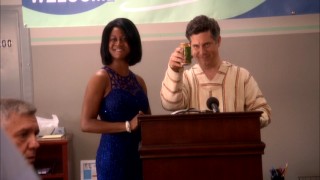 After partying with this Michelle Obama look-alike (Jefandi Cato), TelAmeriCorp CEO Bruce Benson (Chris Parnell) changes his plans for the company.