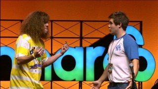 Blake Anderson and Adam DeVine perform a live stage sketch at the 2011 Bonnaroo Music Festival.