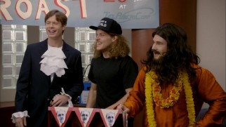 The guys dress up as their favorite Mike Myers movie characters at a co-worker's roast.