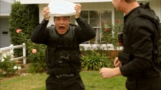 Adam (Adam DeVine) feels the burn of ice in "DeputyDong."