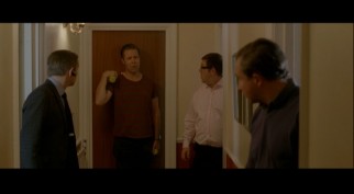 The guys gather in the hall of their bed & breakfast in this lone deleted scene.