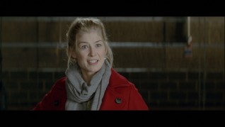Rosamund Pike sees how her character's clothing will look onscreen in this filmed hair and make-up test.