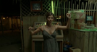 Luisa (Maribel Verd) dances directly over to us after picking B-13 on the jukebox.