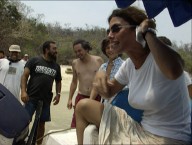 Maribel Verd entertains Alfonso Cuarn and other crew members with the story of her baptismal pranking in "Behind the Scenes."