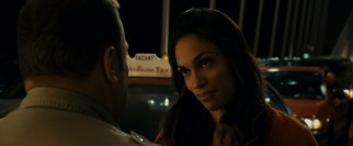 ...that he's hardly noticed Dr. Kate Cooper (Rosario Dawson), the more compassionate bachelorette willing to tilt her head at him.