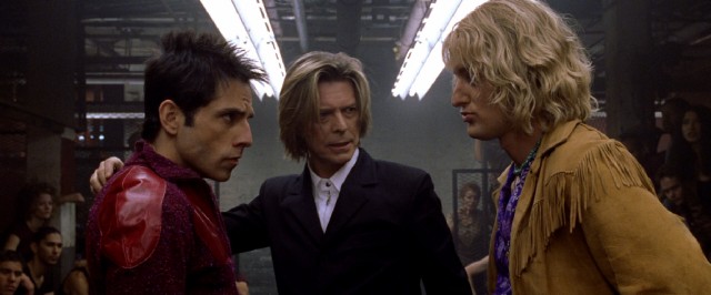 The late David Bowie officiates a walk-off between former Male Model of the Year Derek Zoolander (Ben Stiller) and reigning one Hansel (Owen Wilson).