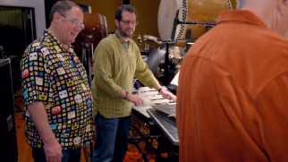 A characteristically colorfully dressed John Lasseter checks in on Michael Giacchino in "Scoretopia."