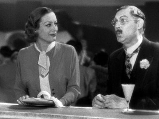 Driven by a looming expiration date, sick Otto Kringelein (Lionel Barrymore) tries a Louisiana Flip cocktail and standing up for himself, to the impressing of Flaemmchen (Joan Crawford).
