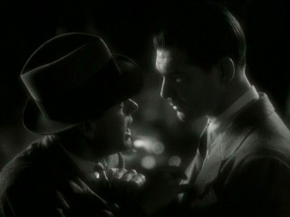 Peter (Clark Gable) explains how things are going to be to Oscar Shapeley (Roscoe Karns), an amusing, fast-talking supporting character who reportedly inspired Bugs Bunny.