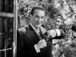 Jack Favell (George Sanders), Rebecca's "favorite cousin", is introduced outside this window.