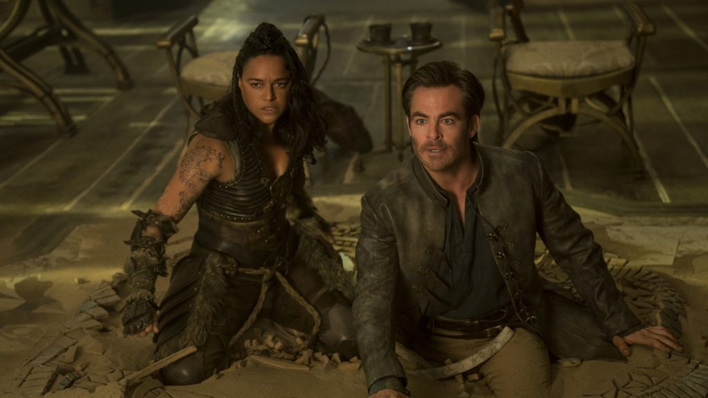 Dungeons & Dragons: Honor Among Thieves 3 Michelle Rodriguez scowls and Chris Pine channels Bill Murray in "Dungeons & Dragons: Honor Among Thieves."