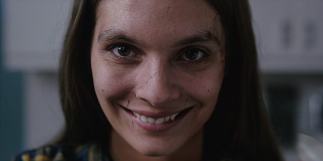 In an early sequence that introduces the concept to us, laura weaver (caitlin stasey) presents a disturbing "smile" to dr. Rose cotter.