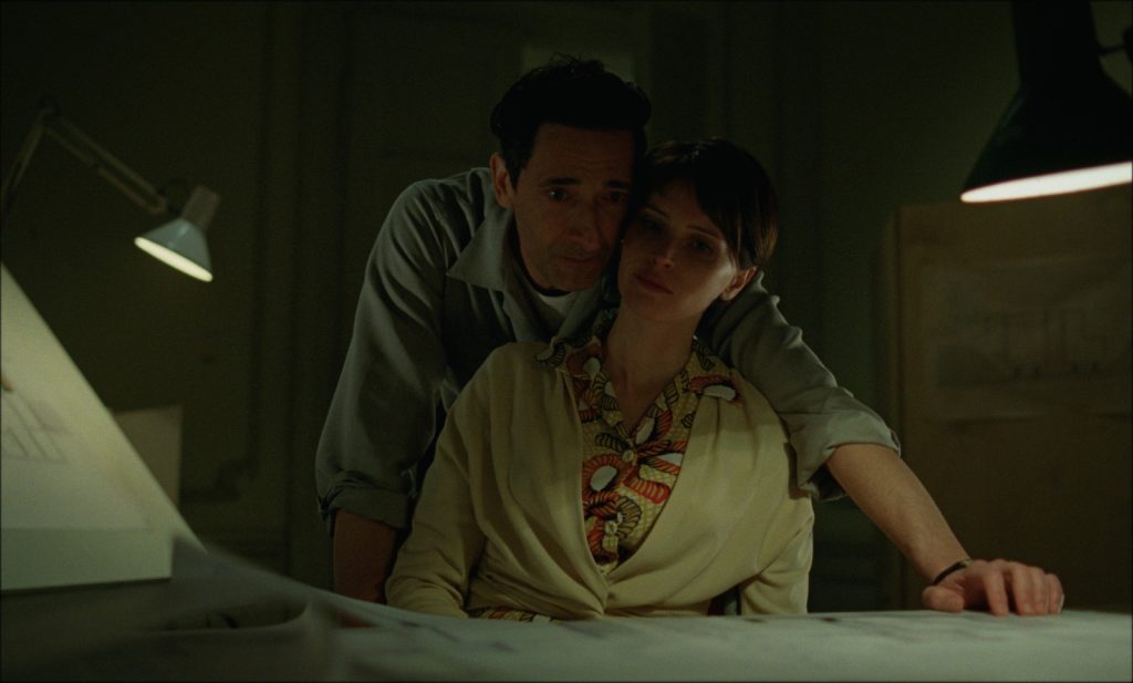 The Brutalist 6 With the help of Van Buren's lawyer, László (Adrien Brody) at last is able to reunite with his ailing wife Erzsébet (Felicity Jones).