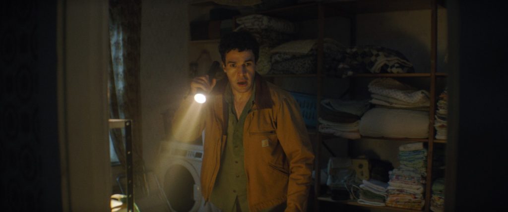 Christopher Abbott wields a flashlight like he's going to turn into a wolf, man.