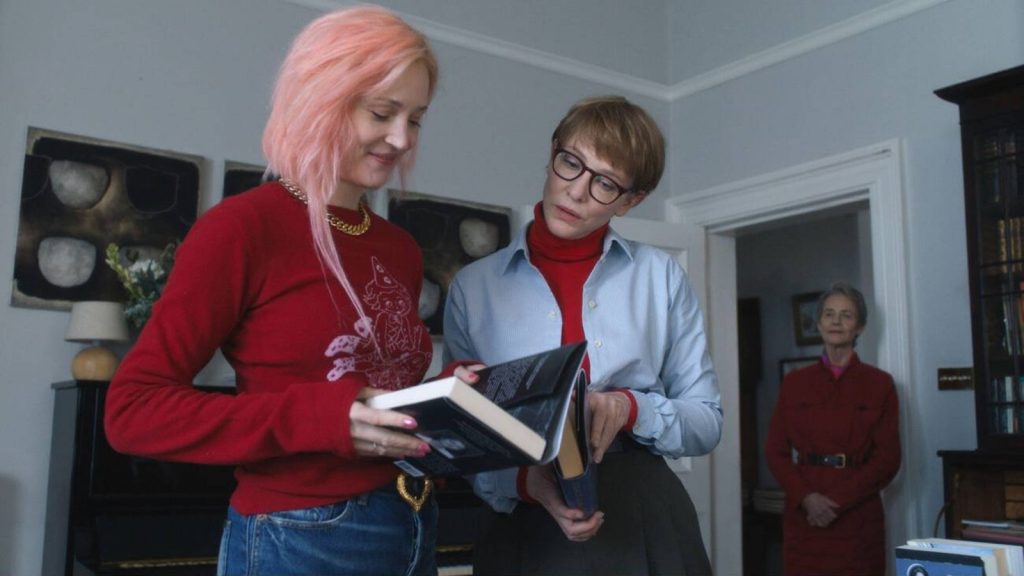 Father Mother Sister Brother Blu-ray 3 Mother (Charlotte Rampling) looks on as sisters (Vicky Krieps and Cate Blanchett) sneak peeks at Mom's latest novels.