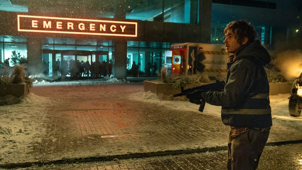 Zach Cregger's "Resident Evil" stars Austin Abrams as a medical courier who learns much about firearms and padlocks in the course of one dangerous, snowy night.